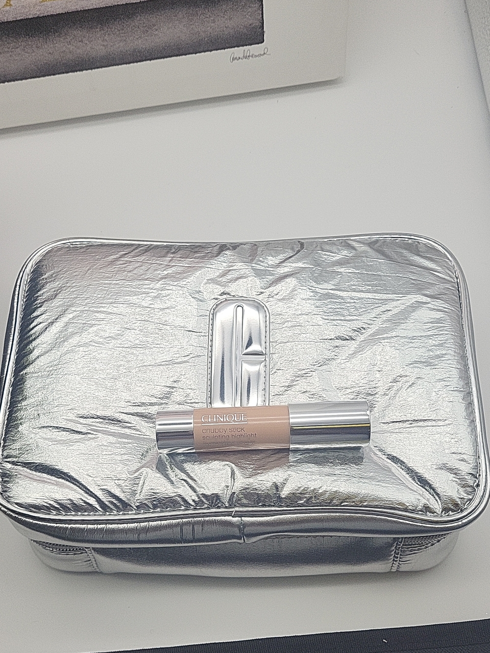Clinique Silver Cosmetic Bag with Chubby Stick Sculpting Highlighter